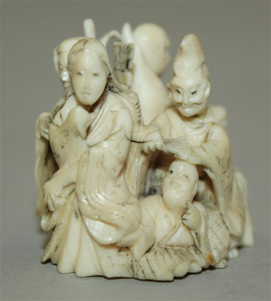 A Japanese small ivory okimono of six immortals, 3.3cm